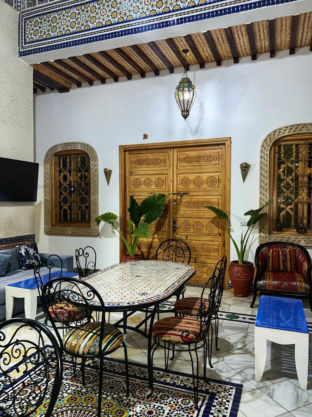 The carved cedar doors of the patio