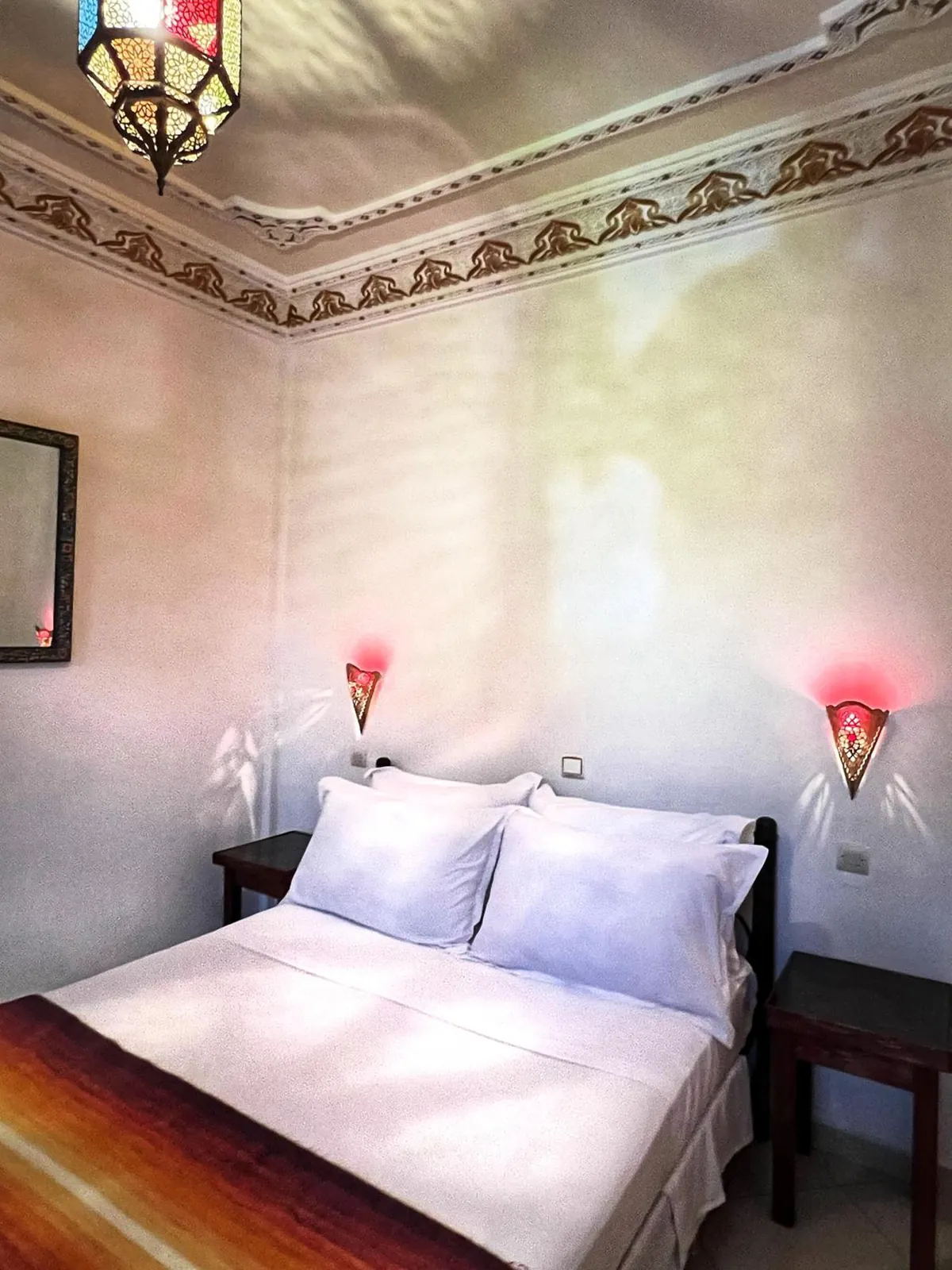 Double room, bed and lantern