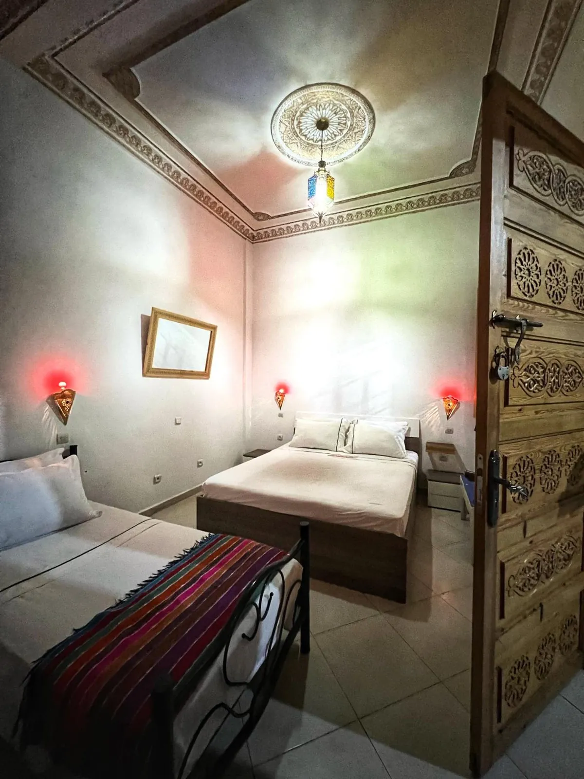 Chambre familiale, lit double et lits simples