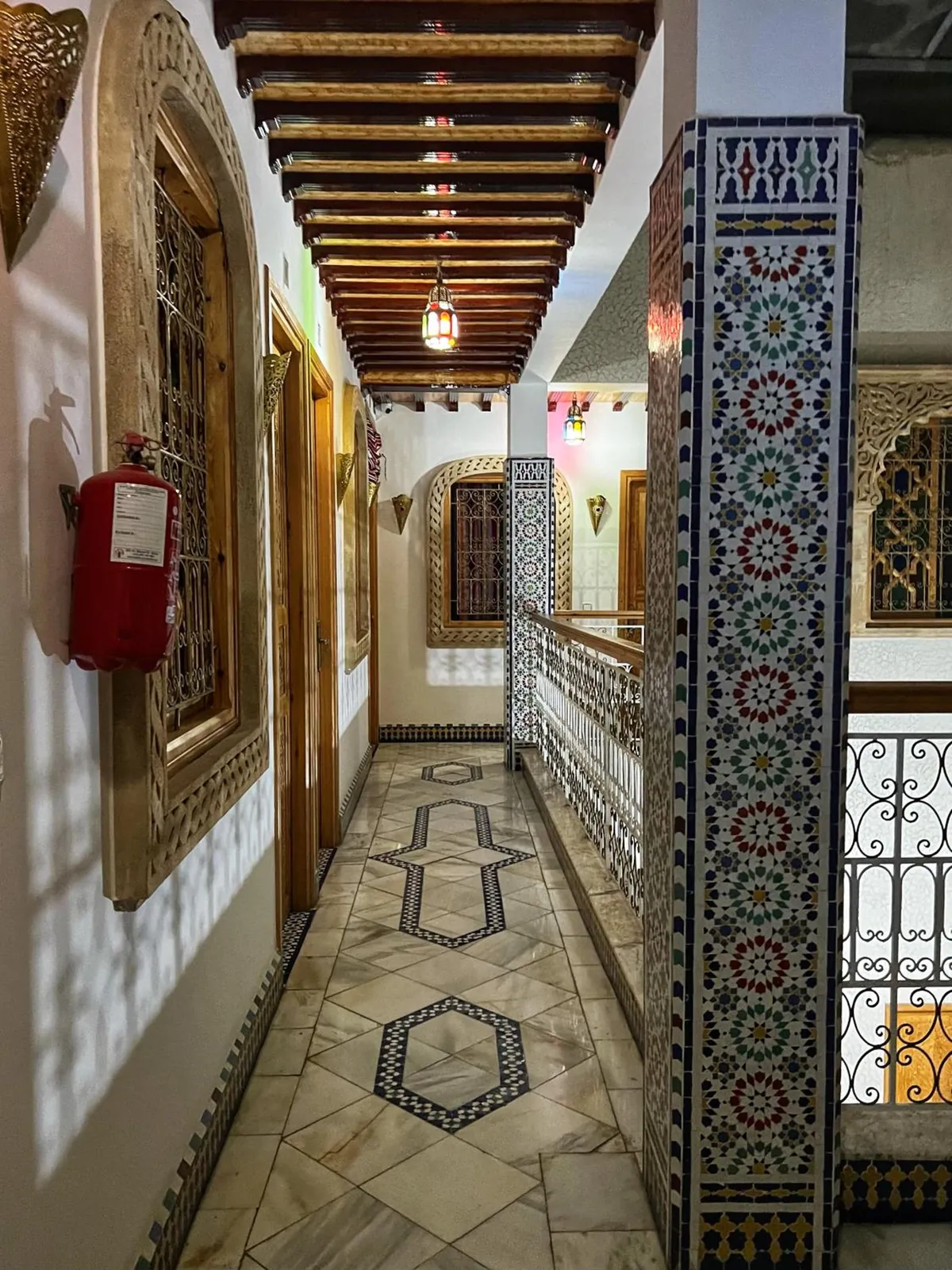 The zellige gallery leading to the rooms